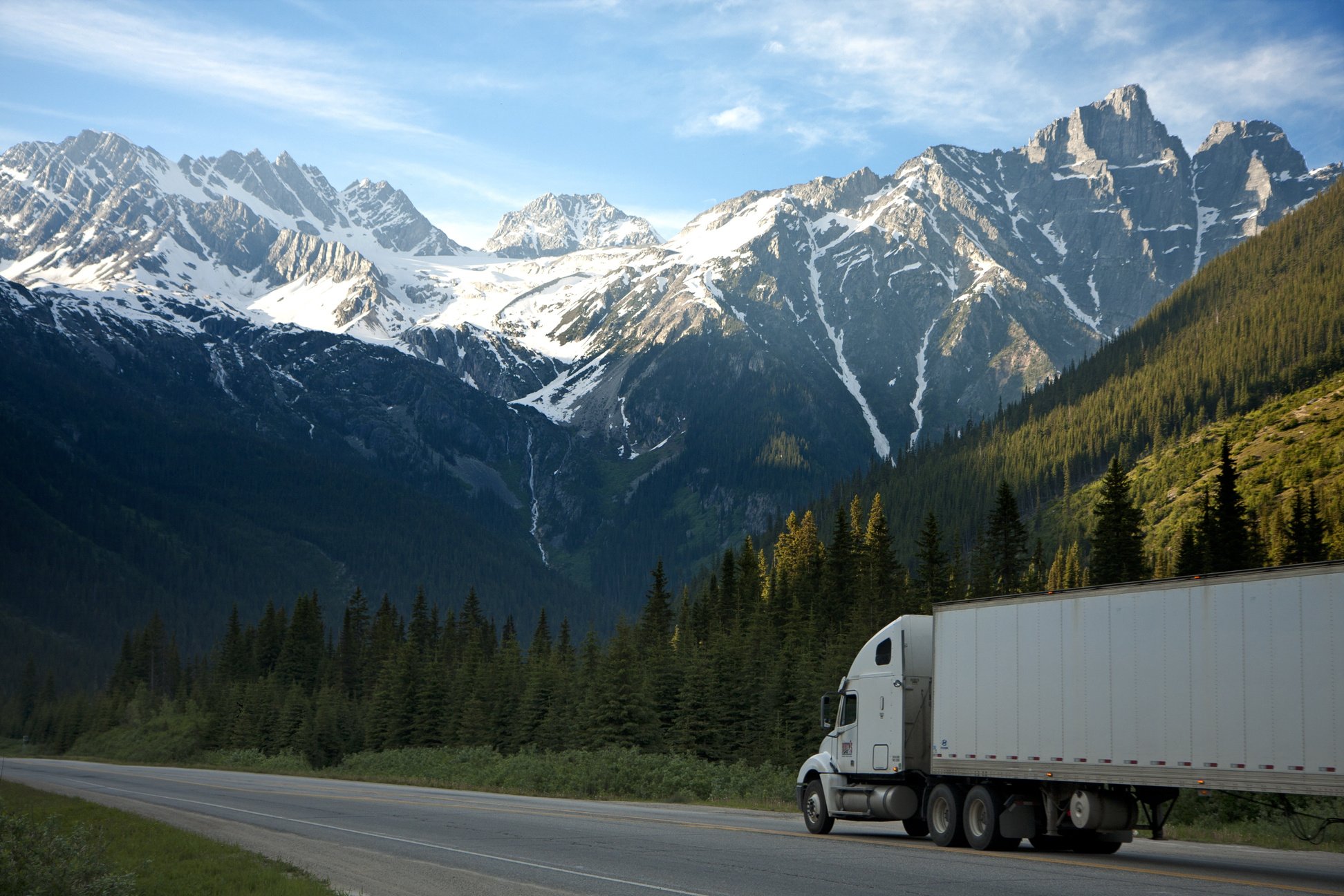 Truck on a Highway By the Mountains